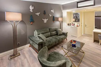 a living room with a couch and a table at Hotel Miniature Istanbul in Istanbul