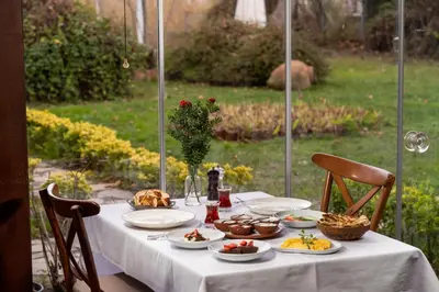 a table with plates of food on top of it at Beta Home Sapanca in Sapanca