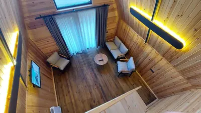an overhead view of a living room with couches and a table at Patya BUNGALOV in Dereköy