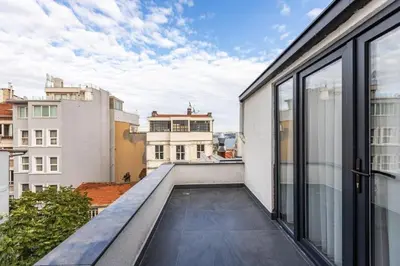 an apartment balcony with a view of the city at Duplex Penthouse wparking 3BD2Bath Views! #340 in Istanbul