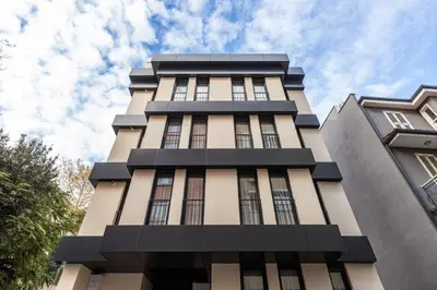 a tall building with a sky in the background at Cozy Bright wParking 2BD1Bath Central Home!#338 in Istanbul