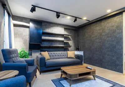 a living room with a couch and a coffee table at The Business Class Suit Karakoy in Istanbul