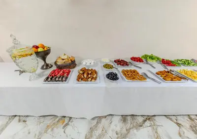 a table with many different types of food on it at The Business Class Hotel in Istanbul