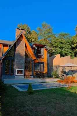 a house with a swimming pool in the yard at Sapanca Grandwooden in Sakarya