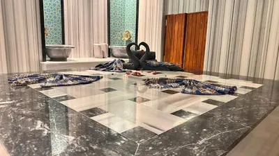 a large marble table with a swan sitting on top of it at Cip Hotel & Spa - İstanbul Bakırköy City Center in Istanbul