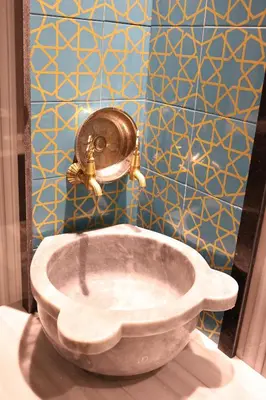 a sink with a faucet in a bathroom at Cip Hotel & Spa - İstanbul Bakırköy City Center in Istanbul