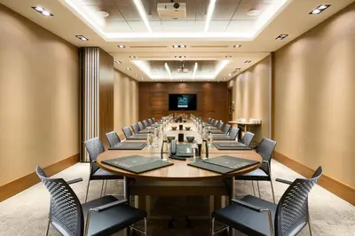 a large conference room with a long table and chairs at AC Hotel Istanbul Macka in Istanbul