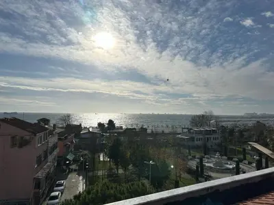 a view of the ocean from a balcony of a city at Sareban Hotel Istanbul in Istanbul