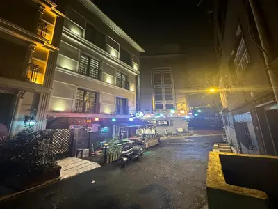 a city street at night with a building at GALATAGREENAPPLEHOTEL in Istanbul
