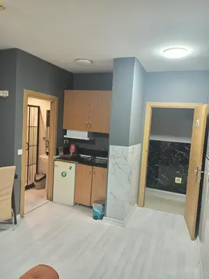 a kitchen being remodeled with a stove and a sink at Rena Apart Hotel in Istanbul
