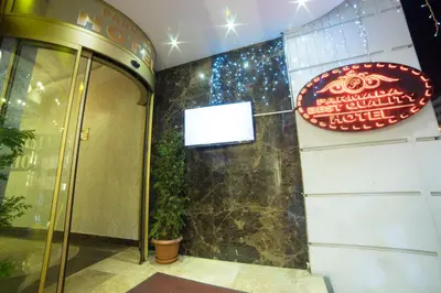 a entrance to a hotel with a sign on a wall at Parmada Hotel in Istanbul