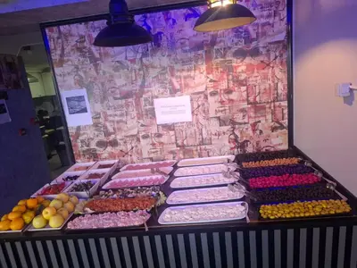 a display case with a bunch of different types of food at Leyenda Boutıque Hotel in Istanbul