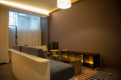 a living room with a couch and a table at Design Apartment near the Bomonti in Istanbul