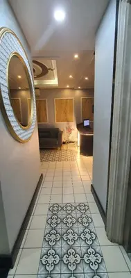 a room with a mirror and a tile floor at taksim k suites in Istanbul