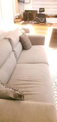 a white couch sitting in a living room at taksim k suites in Istanbul
