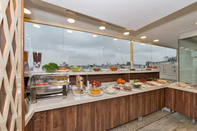 a buffet line with many different types of food at Marcello Hotel in Istanbul