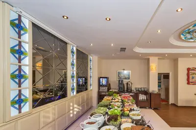 a buffet line with plates of food in a restaurant at Green Anka Hotel in Istanbul
