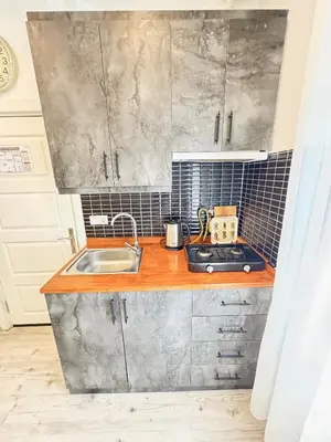 a kitchen with a sink and a counter top at Central of İstanbul near to so many historic place in Istanbul