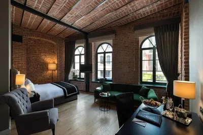 a hotel room with a bed and a couch at Régie Ottoman Istanbul - Special Category in Istanbul