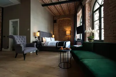 a living room with a bed and a couch at Régie Ottoman Istanbul - Special Category in Istanbul