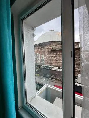 an open window with a view of a building at Le Safran in Istanbul