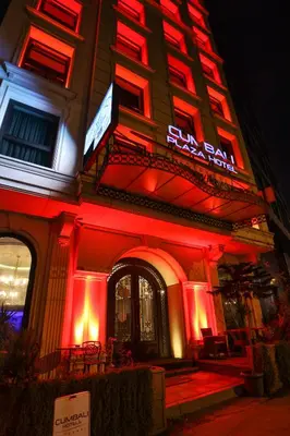 a hotel with red lights on the side of a building at Cumbali Plaza Hotel in Istanbul