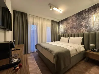 a bedroom with a large bed in a room at Iris Han Hotel in Istanbul