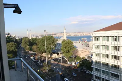 a view of the city from the balcony of a building at Miller Hotel in Istanbul