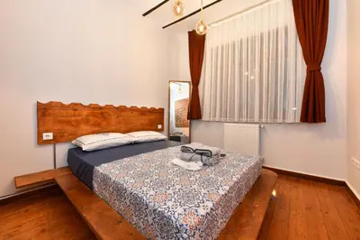a bedroom with a bed with shoes on it at Historical Levantine Flat @Heart of Taksim in Istanbul