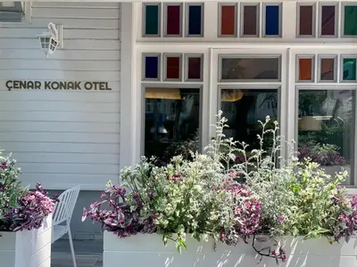 a display of flowers in front of a garden kiwi office at Cenar Konak Butik Hotel in Buyukada