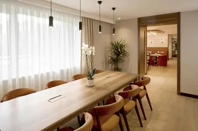 a dining room with a long table and chairs at The Marmara Camlica in Istanbul