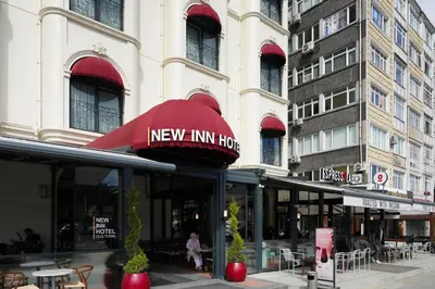 a new inn house with a red awning on a building at New Inn Hotel Old Town in Istanbul