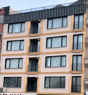 a building with windows and balconies on it at Allegro Apartments Kadıköy in Istanbul