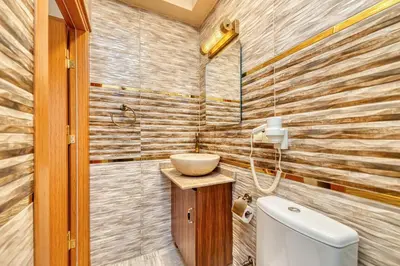 a bathroom with a toilet and a sink at Brown 2 Mansion Oldcity in Istanbul