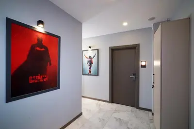 a hallway with a movie poster on the wall at Meet İstanbul Hotel Kadikoy in Istanbul
