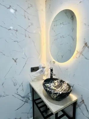 a bathroom with a sink and a mirror at Ninova Boutique Hotel in Istanbul