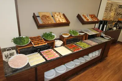 a buffet with many different types of food on display at Pisa Hotel in Istanbul