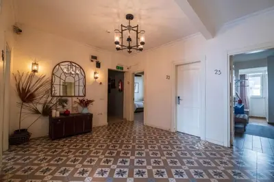 a room with a hallway with a chandelier and a floor at Elite Marmara Express Otel in Istanbul