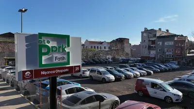 a parking lot with a lot of parked cars at Diamond Beyazit Hotel in Istanbul