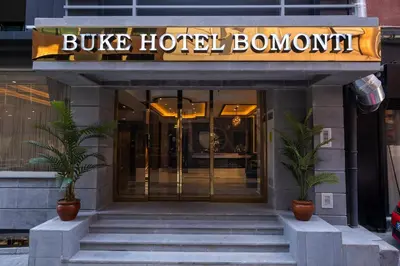 a building with a sign that reads bulgas hotel bonmont at Buke Hotel Bomonti in Istanbul