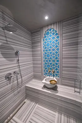a bathroom with a shower with a toilet and a window at Ring Stone Hotels Old City - Special Class in Istanbul