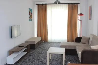 a living room with a couch and a table at KAT11 in Beylikduzu