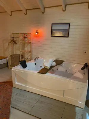 a large bath tub sitting in a room at BungalovCity in Sapanca