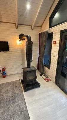a stove in the corner of a room at BungalovCity in Sapanca