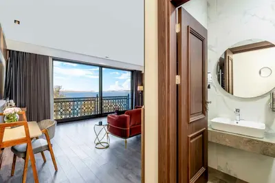 a bathroom with a room with a view at Ezkar Bathonea Art İstanbul Hotel in Avcılar