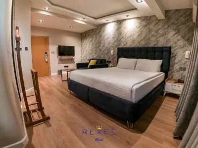 a hotel room with a bed and a television at Taksim REXXEE Istanbul Istiklal Hotel in Istanbul