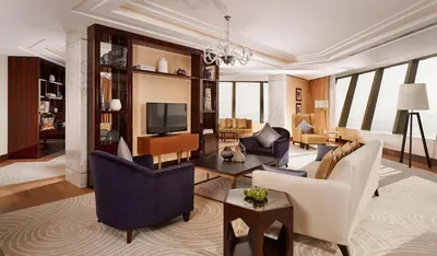 a living room filled with furniture and a tv at Hyatt Regency Istanbul Atakoy in Istanbul