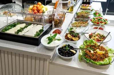 a buffet line with many different dishes of food at Thank You Hotel Sultanahmet in Istanbul
