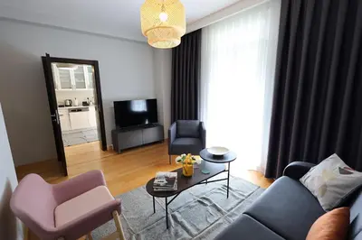 a living room with a couch and a table at İstanbul Guesthouse in Istanbul