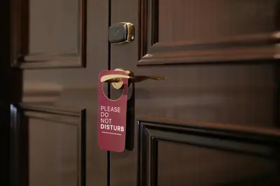 a door knob with a pink door tag on it at No25 Suites Nisantasi in Istanbul
